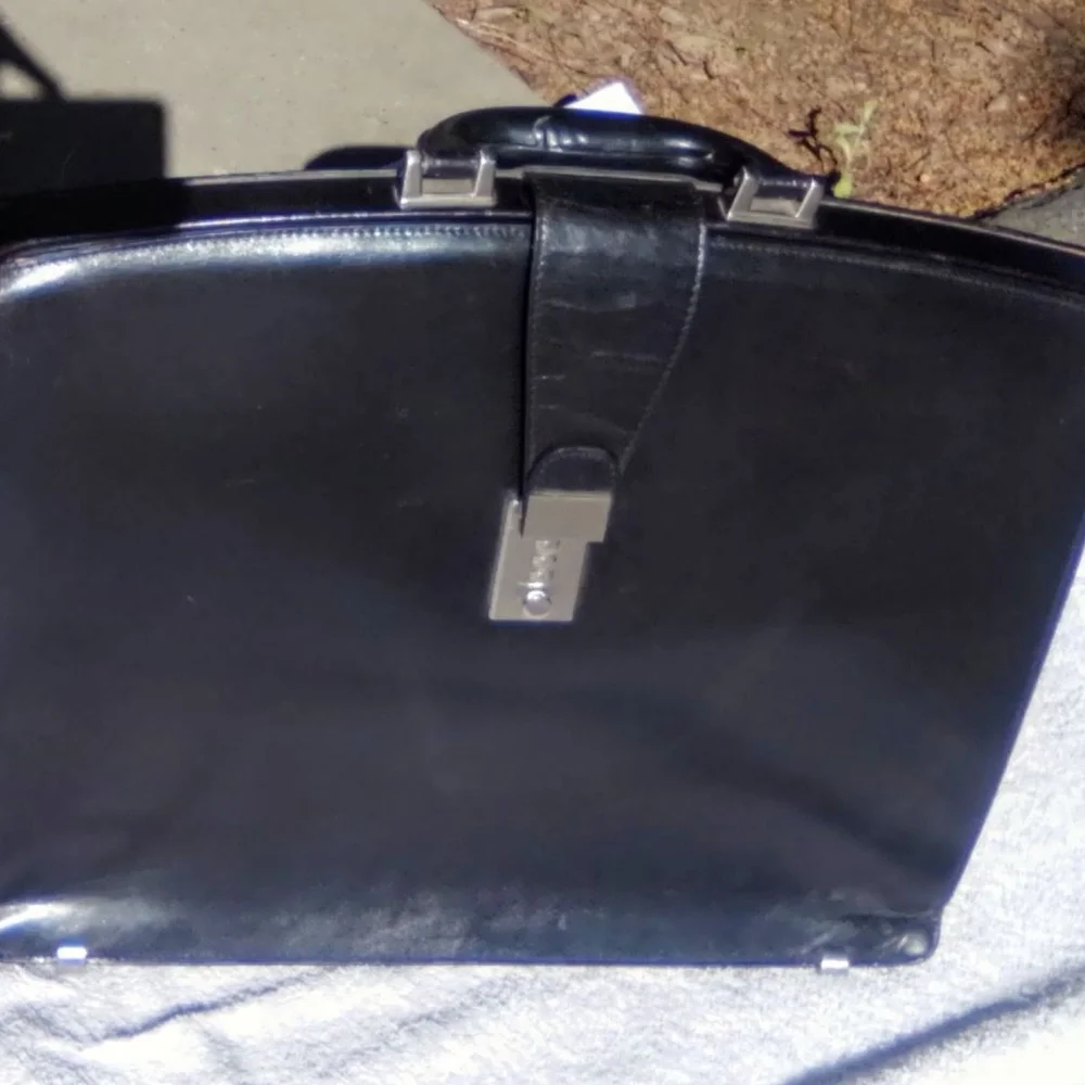 Classic Black Leather Men's Briefcase with Polished Silver Accent